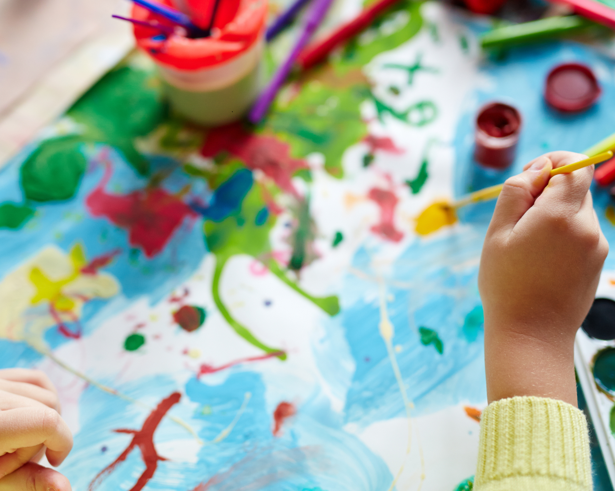 Homeschool students creating art during a Young Artists class in the Adventures Beyond the Book program at Impact Sports Center in Lodi.